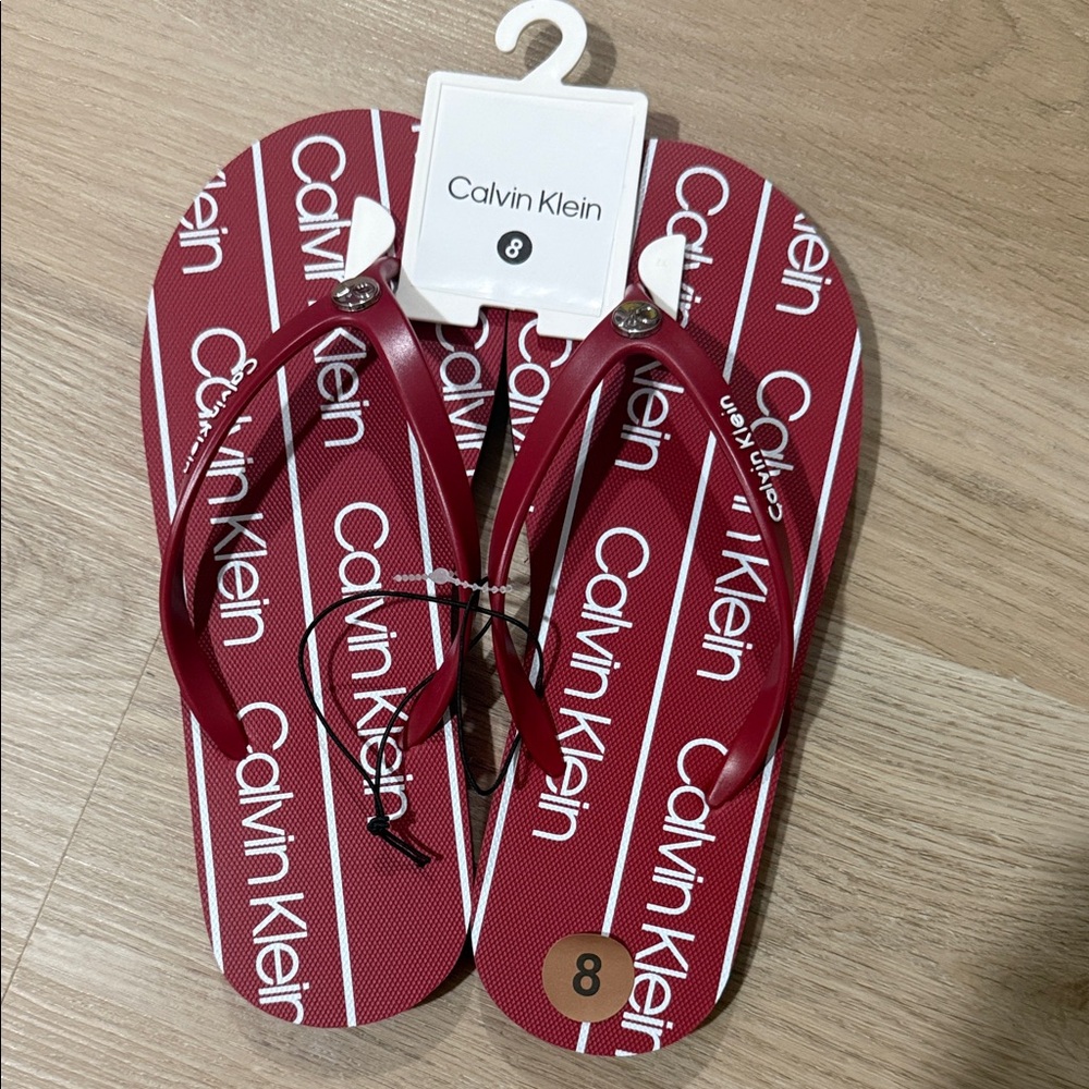 Calvin Klein Red and White Logo Flip Flops